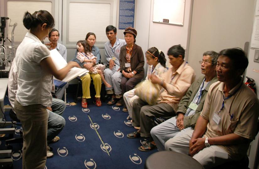 Patients in an overcrowded waiting room