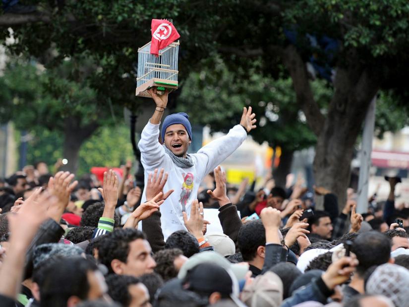 Thousands march in Tunis celebrating the toppling of the country's dictatorial president