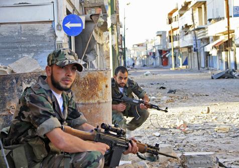 Syrian rebels on patrol when they controlled Qusair