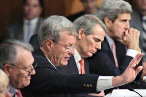 Sen. Max Baucus (speaking) and other members of the "supercommittee" at a congressional hearing