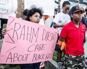 Chicago students gather for a vigil against the city's plan for school closings